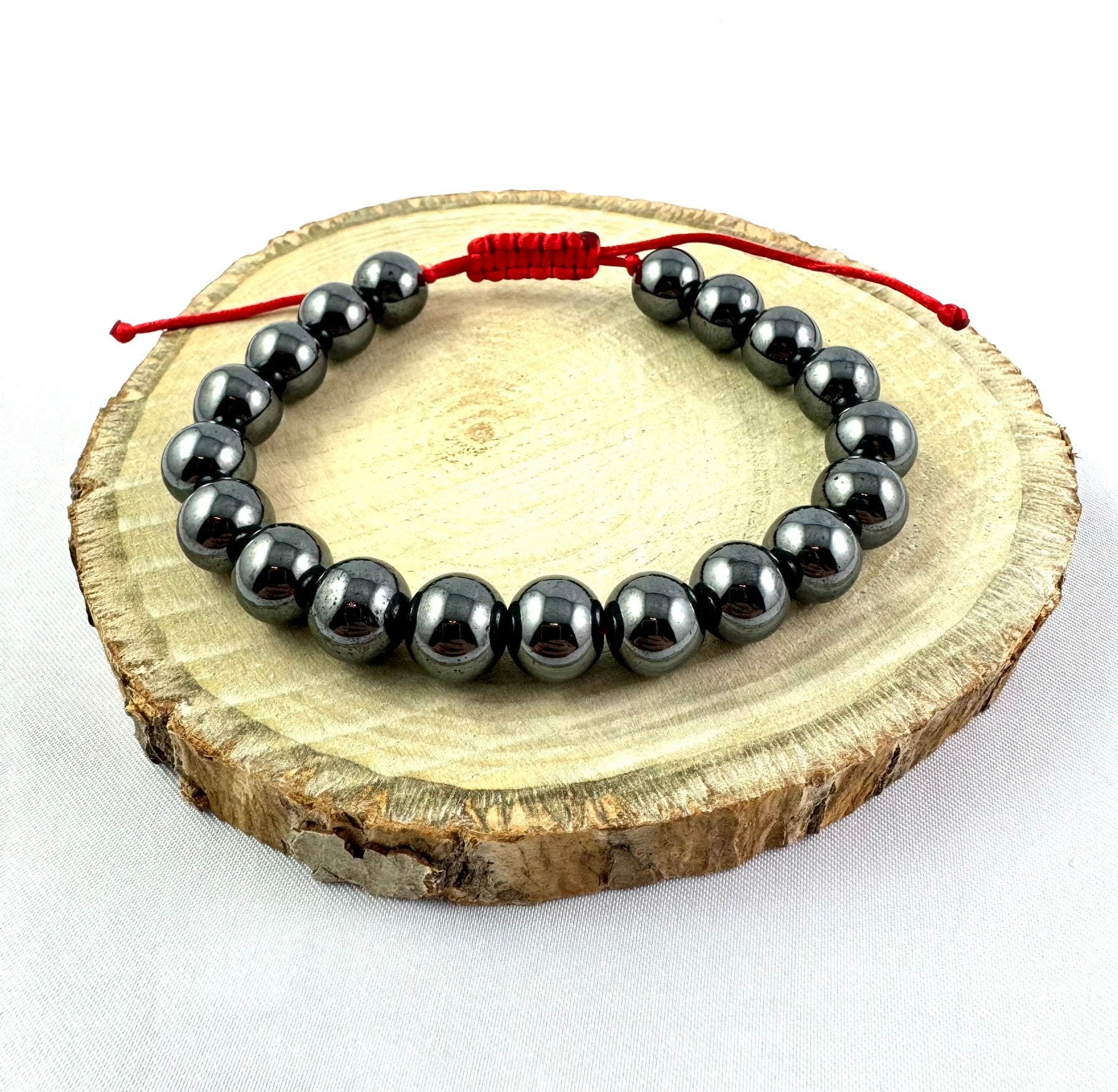 Náramok z minerálov Hematit 10 mm sivý na červenej šnúrke-Bracelets-DIARAfashion-Dámsky-DIARA.sk