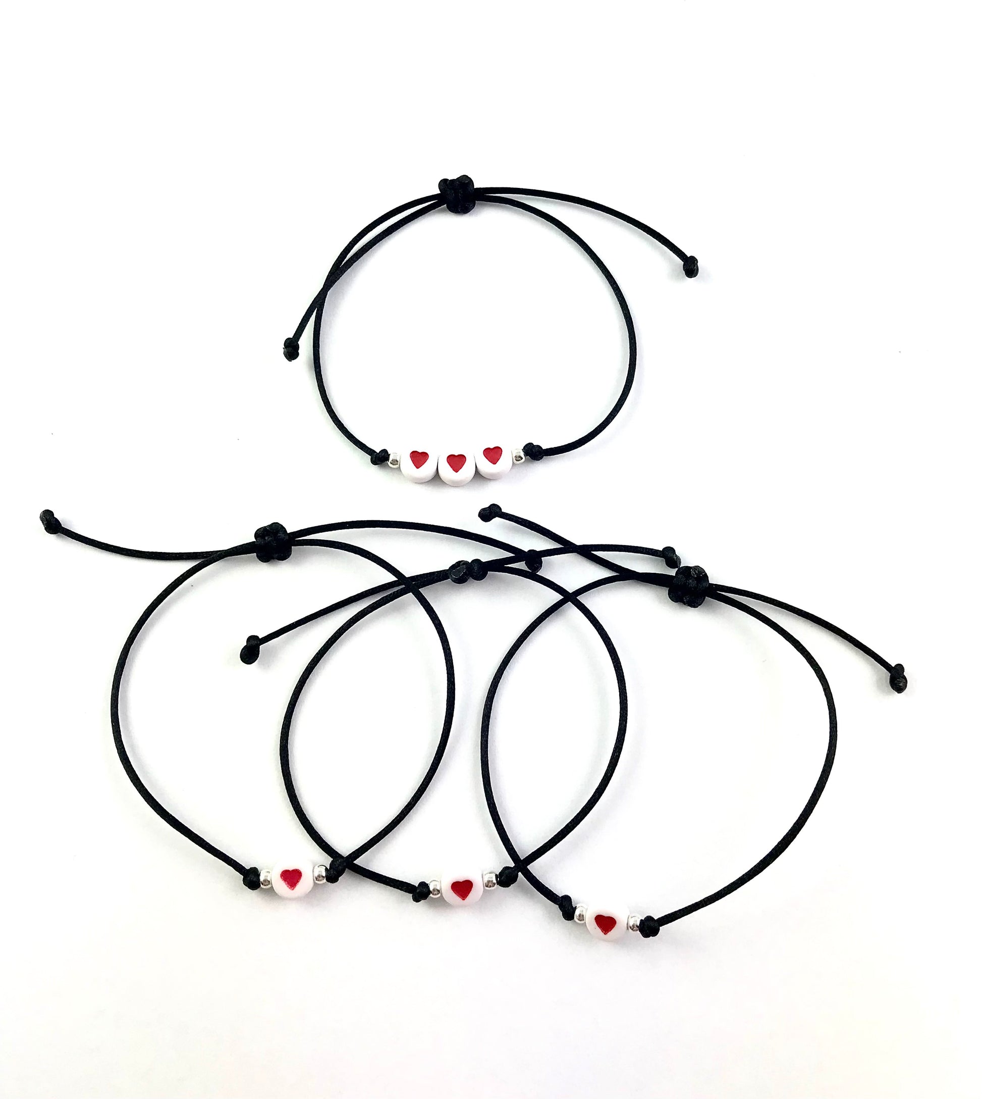 Šnúrkové náramky set 4 ks čierne so srdiečkami-Bracelets-DIARA-DIARA.sk